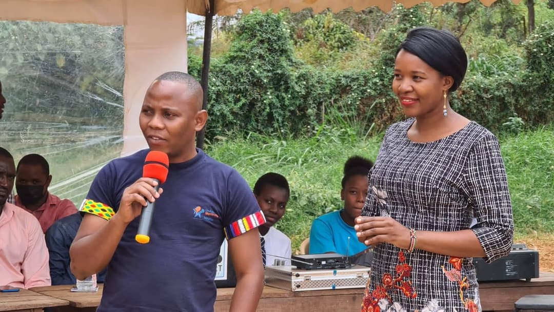 Presenter speaking to a group of students